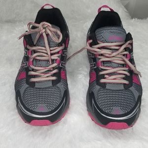 Black and pink running shoes